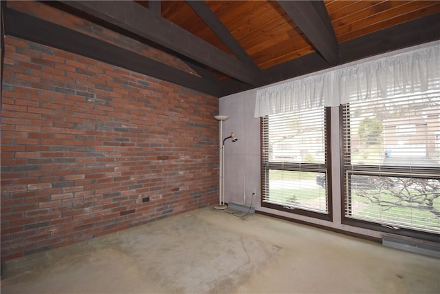 carpeted empty room featuring vaulted ceiling with beams, wood ceiling, a wealth of natural light, and brick wall