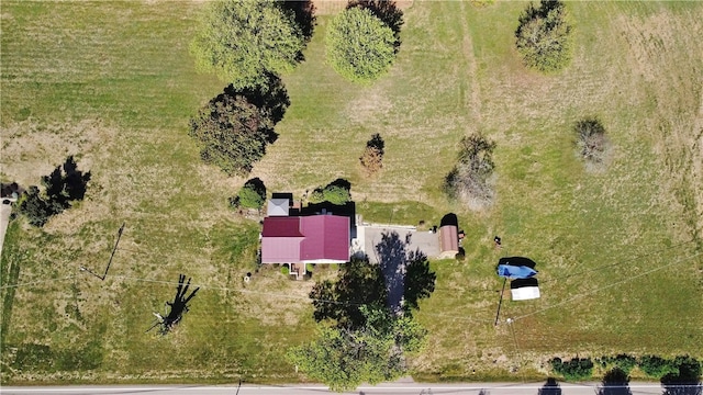 birds eye view of property featuring a rural view