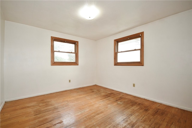 empty room with light wood-type flooring