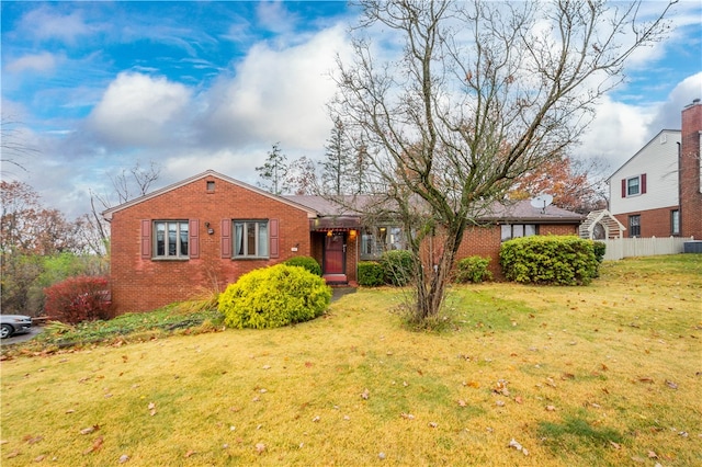 view of front of home with a front lawn