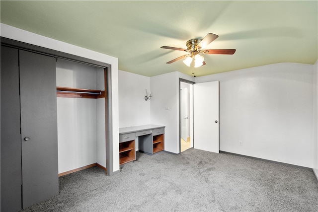 unfurnished bedroom featuring ceiling fan, carpet floors, and a closet