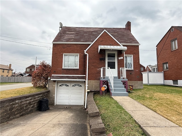 view of front of house featuring a garage and a front lawn