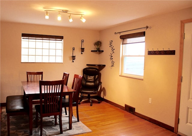 dining area featuring light hardwood / wood-style floors