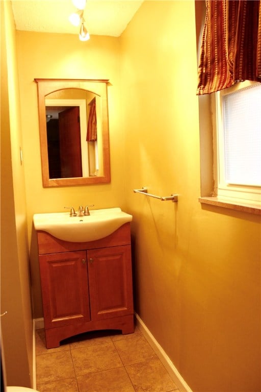 bathroom with vanity and tile patterned floors