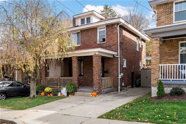 view of front of home featuring covered porch