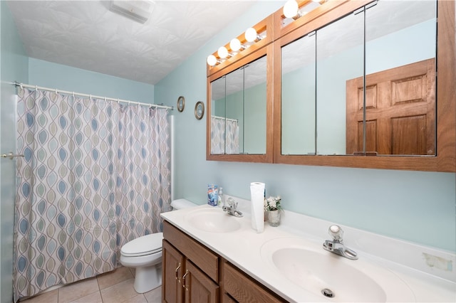 bathroom with tile patterned floors, vanity, toilet, and a shower with curtain