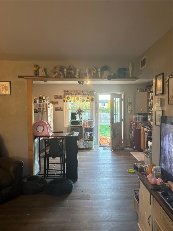 living room with dark wood-type flooring