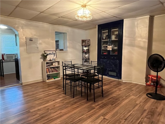 dining space with dark wood-type flooring