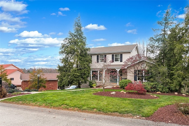 view of front of house with a front yard