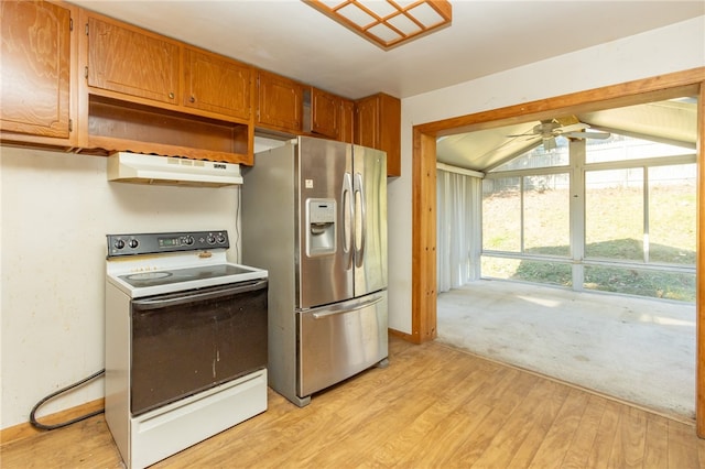 kitchen with stainless steel fridge, light wood-type flooring, white range with electric stovetop, ceiling fan, and lofted ceiling