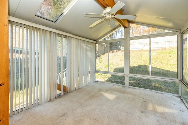 unfurnished sunroom featuring lofted ceiling with beams and ceiling fan