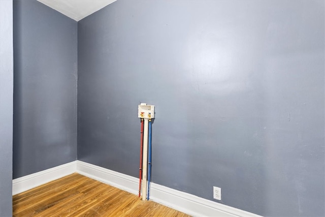 empty room featuring wood-type flooring