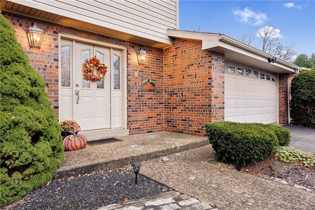 entrance to property featuring a garage