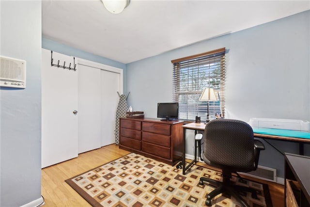 office space featuring light hardwood / wood-style floors