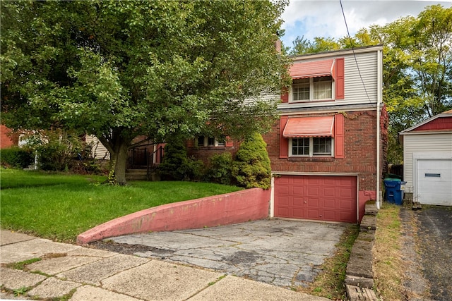 view of front facade featuring a front yard and a garage