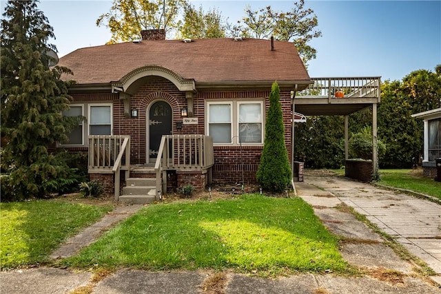 54 Buhl Ct, Sharon, PA 16146 - view of front facade featuring brick siding, driveway, a chimney, a deck, and a front yard