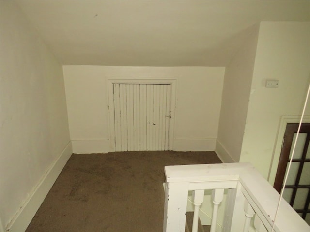 additional living space with carpet flooring