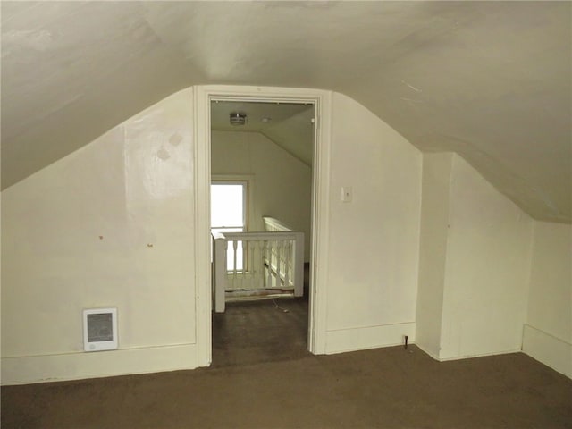 bonus room featuring vaulted ceiling