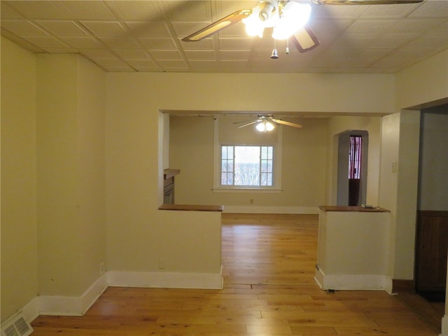 spare room featuring light wood-type flooring