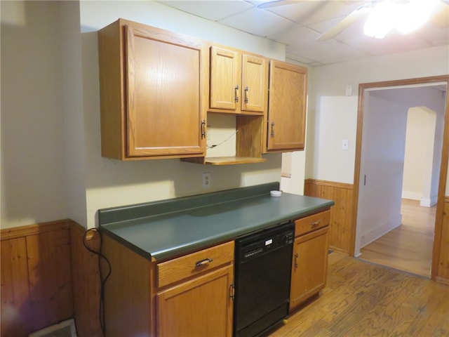 kitchen with ceiling fan, dishwasher, hardwood / wood-style floors, and a drop ceiling