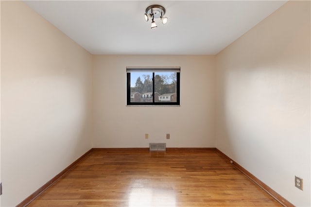 empty room with light wood-type flooring