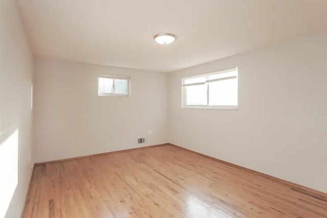 basement featuring light hardwood / wood-style floors