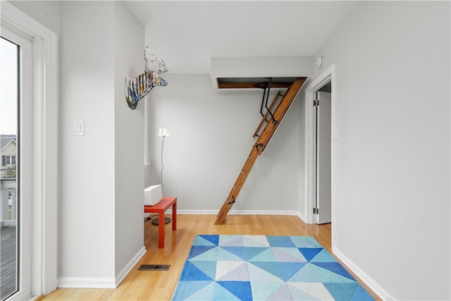 hall featuring light wood-type flooring