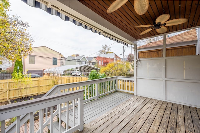 wooden deck with ceiling fan