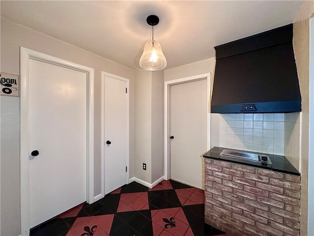 interior space with dark tile patterned floors