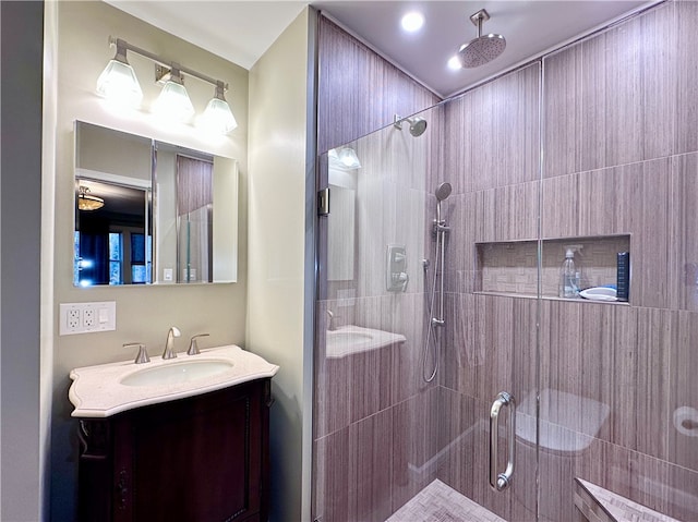 bathroom with vanity and walk in shower