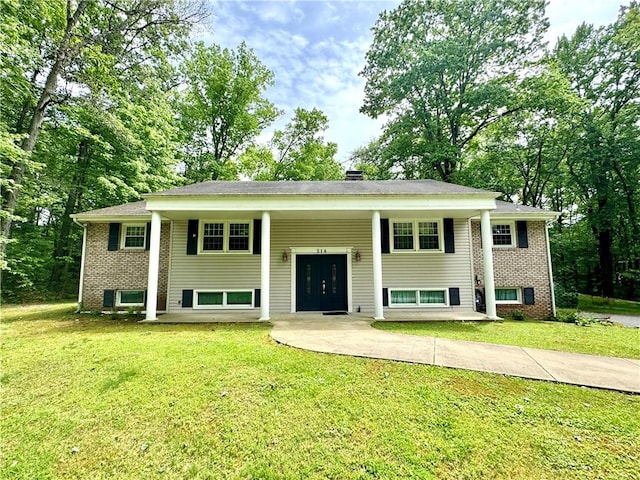 214 Raptor Cir, Neshannock Twp, PA 16105 - raised ranch featuring a front yard and brick siding