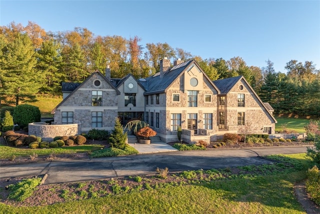 514 Justabout Rd, Peters Twp, PA 15367 - view of front of home with a chimney and stone siding