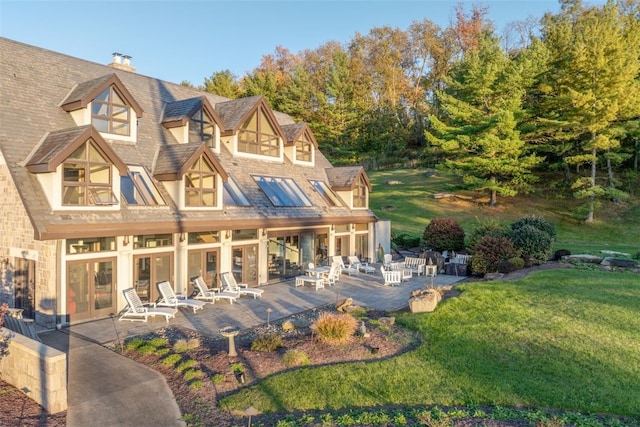 514 Justabout Rd, Peters Twp, PA 15367 - back of property featuring a yard, a patio, french doors, and a chimney