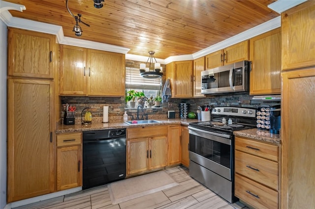 kitchen featuring sink, crown molding, tasteful backsplash, light stone counters, and stainless steel appliances