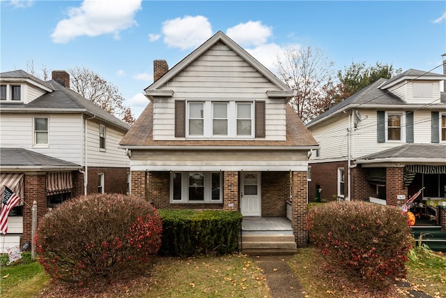 view of property featuring a porch