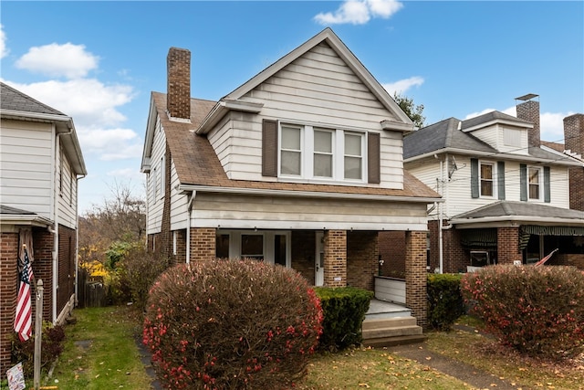 view of property with covered porch