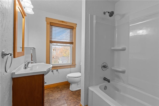 full bathroom with plenty of natural light, vanity, bathtub / shower combination, and toilet