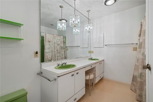 bathroom with vanity and walk in shower