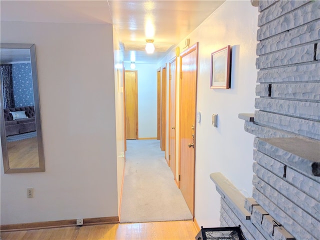 hallway featuring light hardwood / wood-style flooring