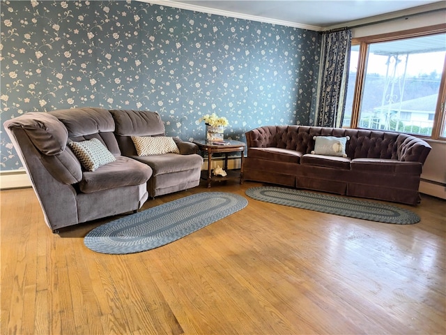 living room featuring wood-type flooring and ornamental molding