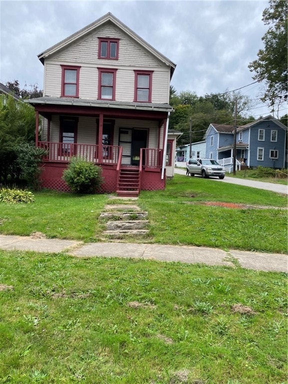 11947 Pennsylvania Ave, Vernon Twp, PA 16335 - view of front of property with a porch and a front lawn