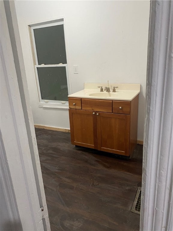 11947 Pennsylvania Ave, Vernon Twp, PA 16335 - bathroom featuring vanity and hardwood / wood-style flooring