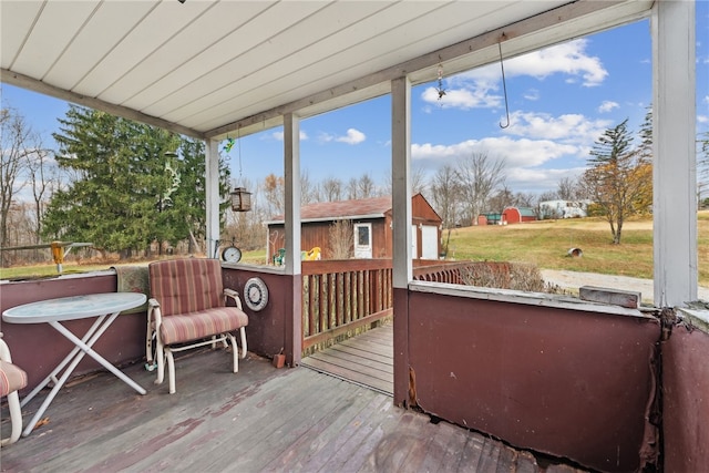 deck with an outbuilding