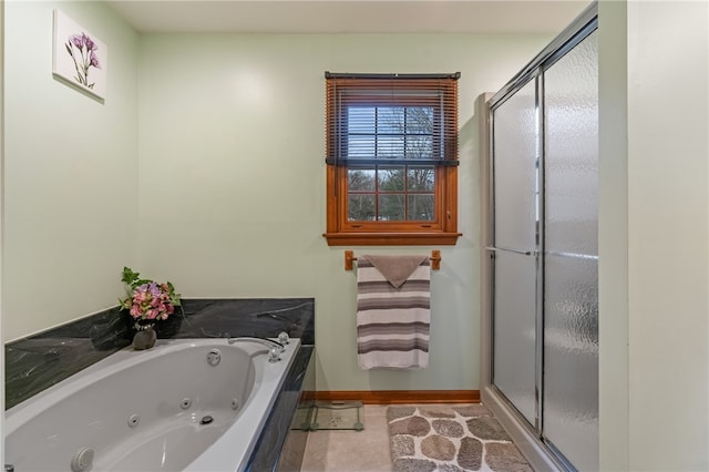 bathroom with tile patterned flooring and plus walk in shower