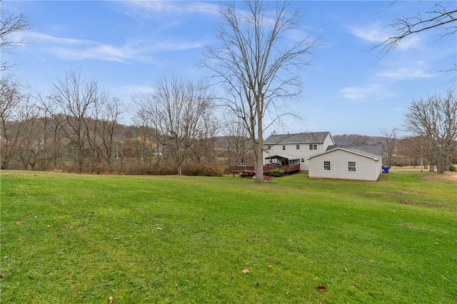 view of yard with a deck