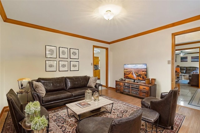 104 Caromar Dr, Adams Twp, PA 16046 - living room with wood finished floors, crown molding, and a ceiling fan