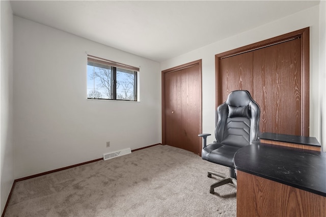 view of carpeted office space