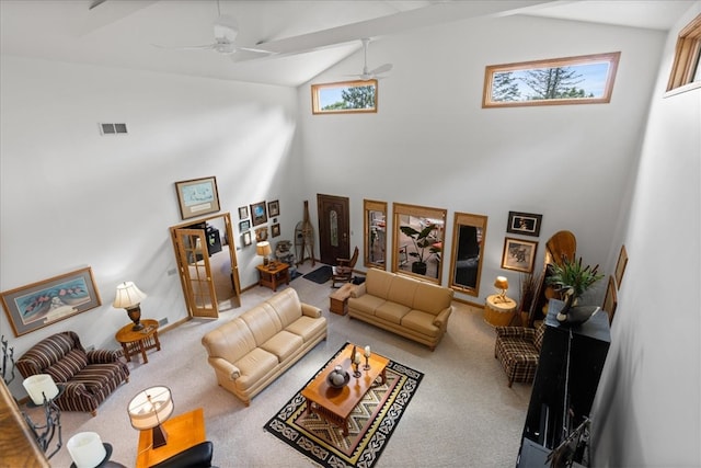 living room featuring carpet, ceiling fan, and high vaulted ceiling