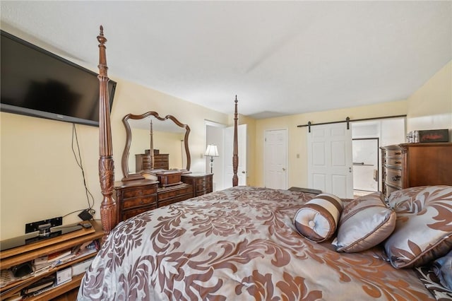 bedroom with a barn door