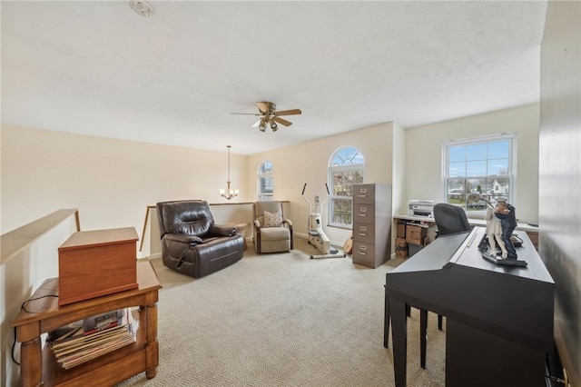 office with light colored carpet and ceiling fan with notable chandelier